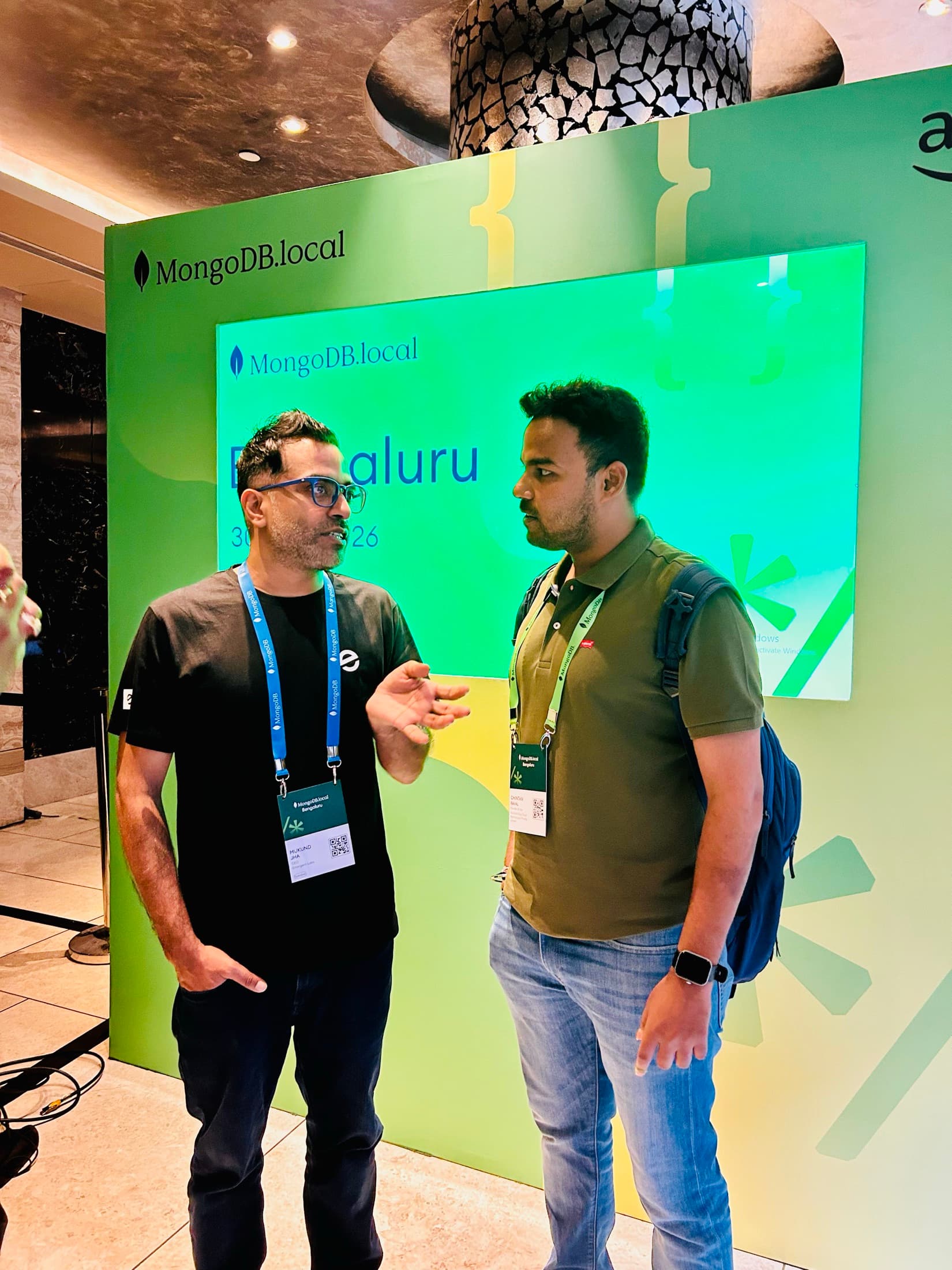 Chintan Raval in conversation with an attendee at MongoDB.local Bengaluru 2026